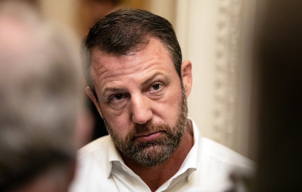 Sen. Markwayne Mullin speaks to reporters on Capitol Hill.