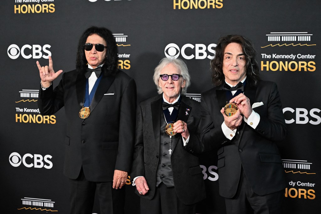 Kennedy Center Honorees and members of the U.S. rock band KISS Gene Simmons, left, Peter Criss, and Paul Stanley arrive for the 48th Kennedy Center Honors gala at the Kennedy Center.