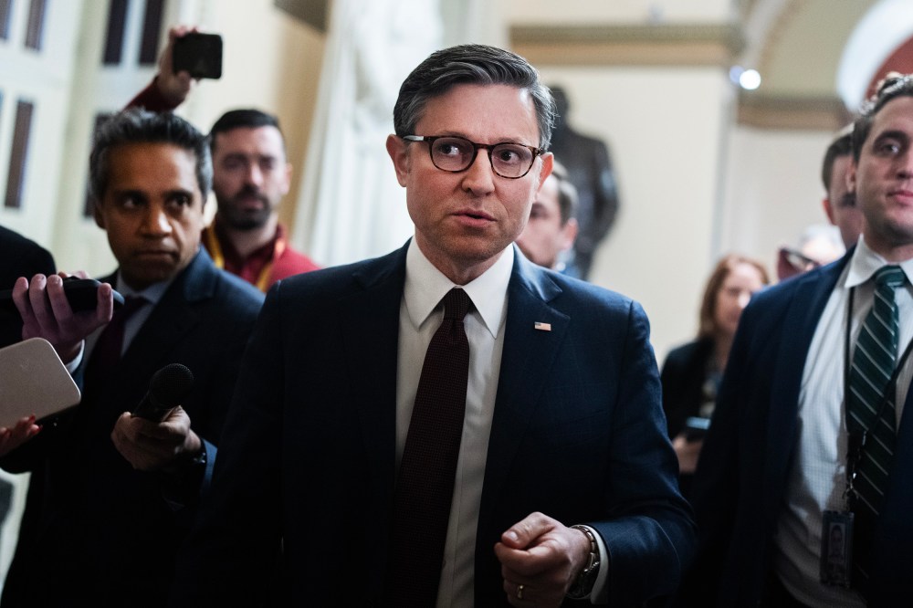 Speaker of the House Mike Johnson, R-La., talks with reporters in the U.S. Capitol during the last votes of the year.