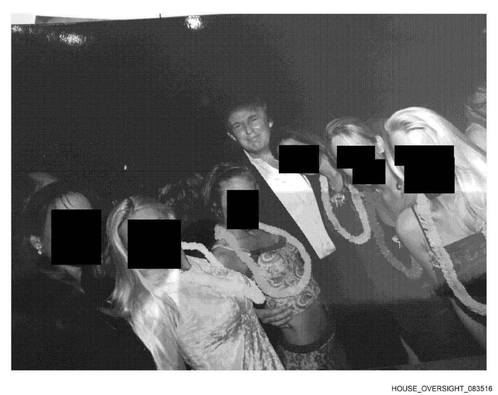 Donald Trump is seen in a scan of a photo with multiple women