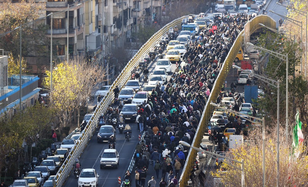 Protesters march in downtown Tehran on Dec. 29.