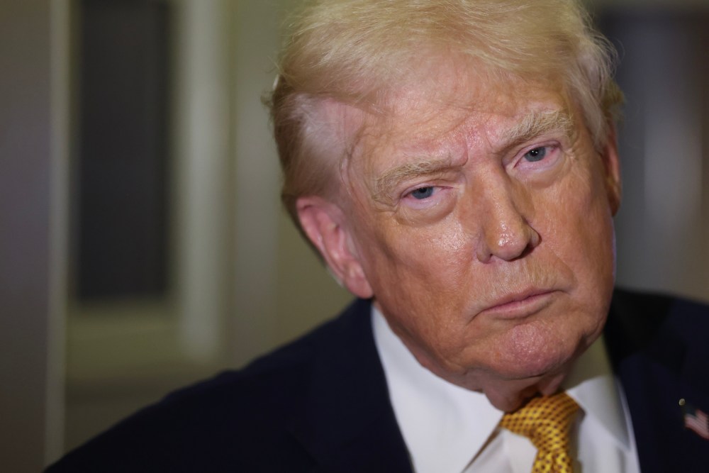 President Donald Trump wearing a gold tie.
