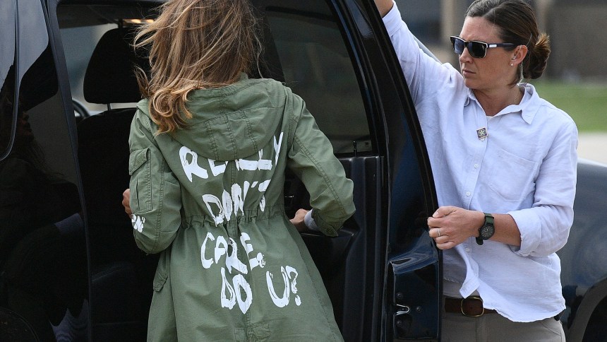 Melania Trump gets in a car, wearing a jacket that reads " I don't really care. Do you?"